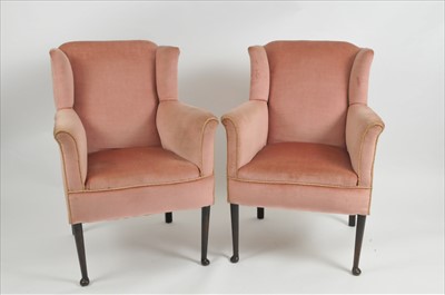 Lot 427 - A pair of late 19th  / early 20th century upholstered wingback armchairs