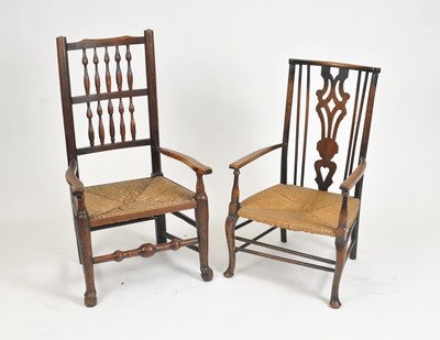 Lot 370 - An oak spindle-back rush seated armchair