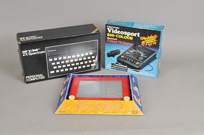 Lot 280 - A boxed Sinclair ZX spectrum, an etch-a-sketch console and a Videosport console