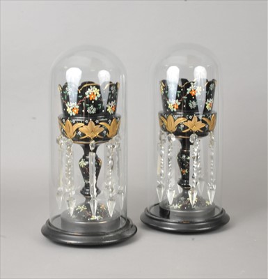 Lot 13 - A pair of Victorian glass table lustres under domes
