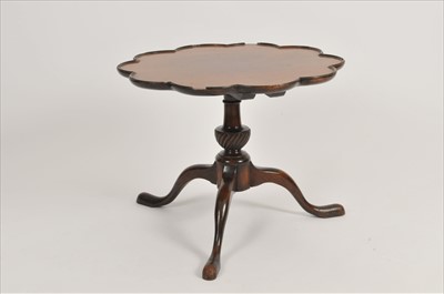 Lot 416 - A small mahogany tripod occasional table