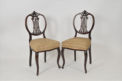 Lot 406 - A pair of mahogany dining chairs