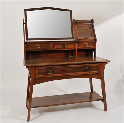 Lot 435 - A walnut dressing table in the Liberty manner