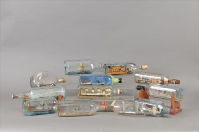 Lot 204 - A collection of 20th century hand painted ships in bottles