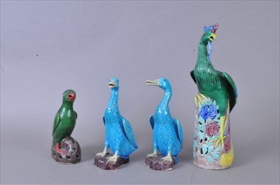 Lot 453 - A group of brightly coloured Chinese earthenware birds