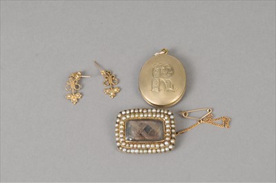Lot 376 - A 19th century seed pearl set mourning brooch