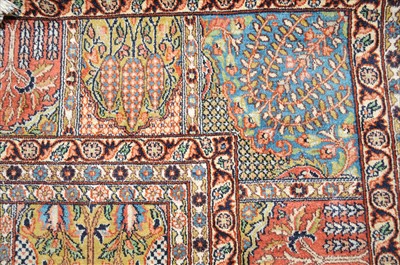 Lot 744 - A large Kashmir woven rug