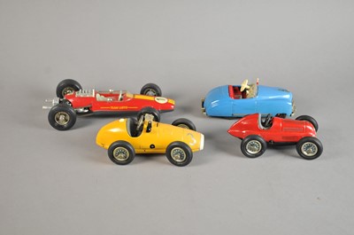 Lot 294 - A collection of four Schuco clockwork model cars