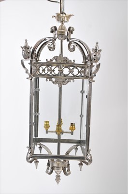 Lot 486 - A large, decorative chrome porch lantern in the George III style