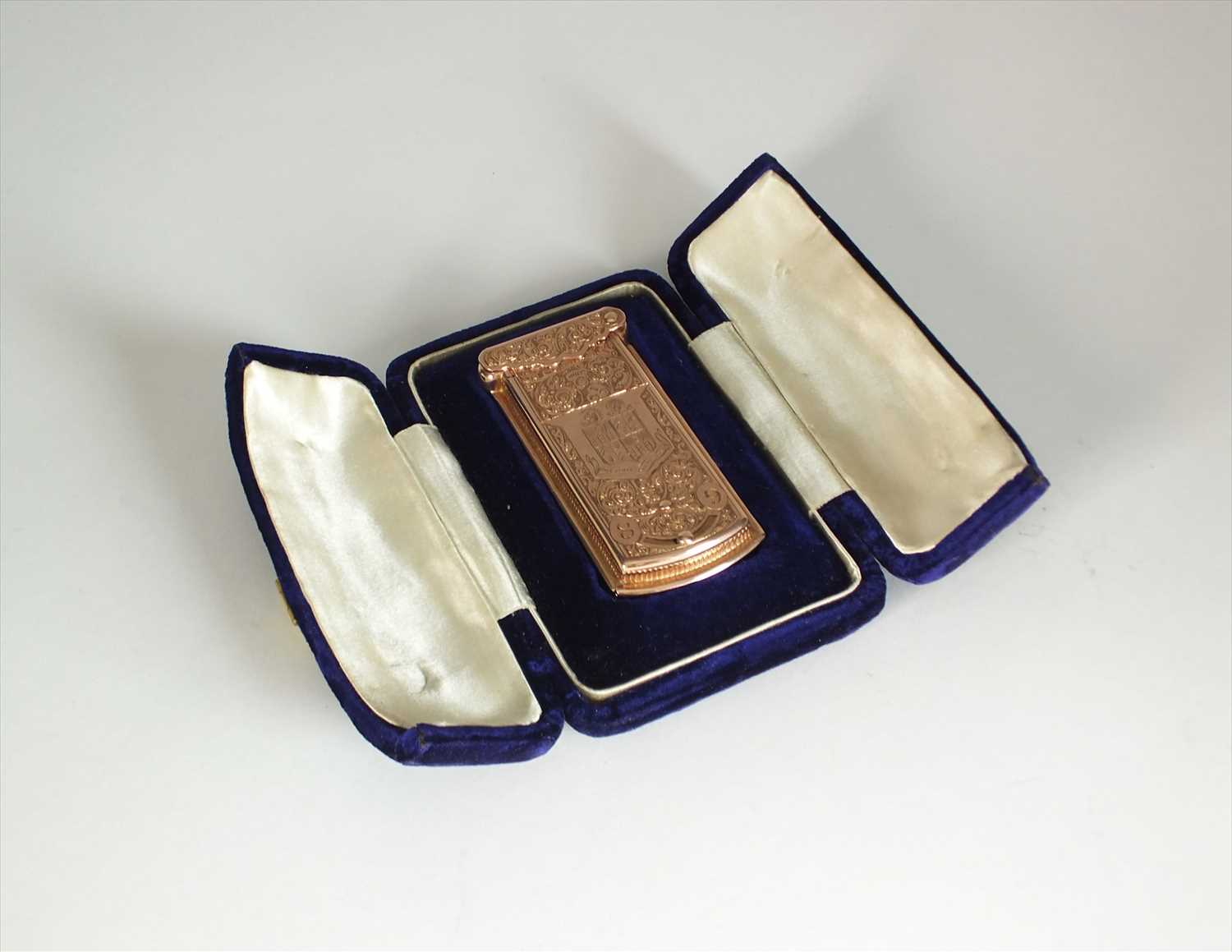 Lot 50 - A cased Victorian 9ct gold presentation needle case