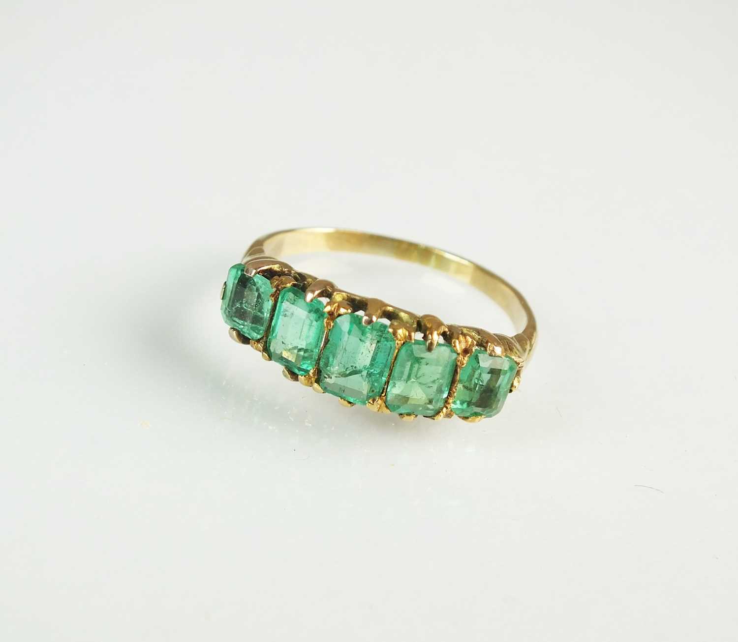Lot 63 - A 19th century five stone emerald ring