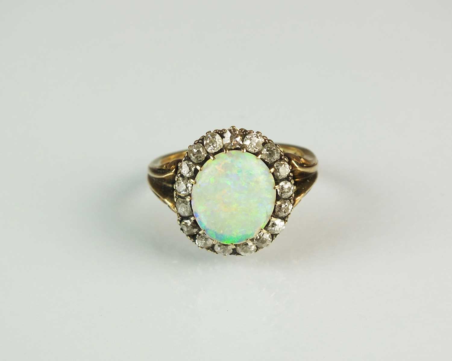 Lot 65 - A 19th century opal and diamond cluster ring
