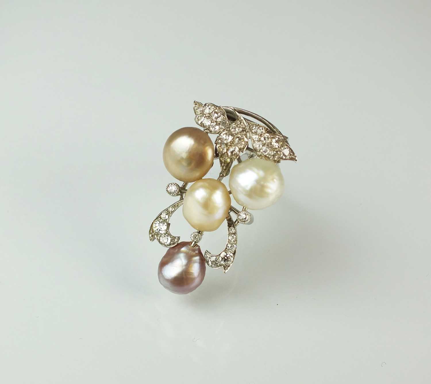 Lot 64 - A diamond and pearl clip brooch