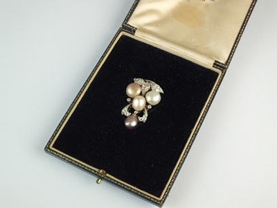 Lot 64 - A diamond and pearl clip brooch