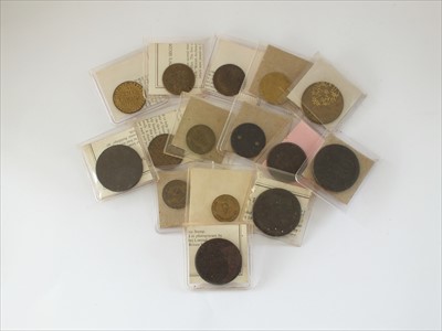 Lot 241 - A collection of British and Foreign trade tokens