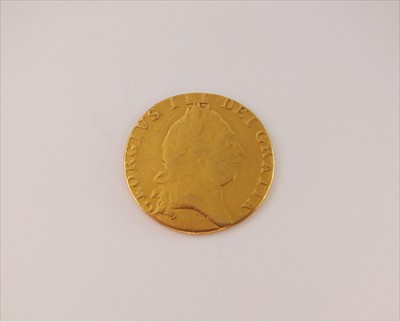 Lot 164 - A George III spade guinea dated 1790