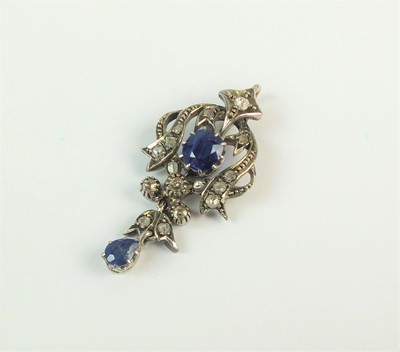 Lot 118 - A sapphire and diamond pendant