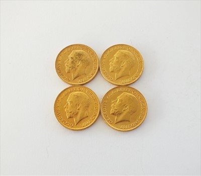 Lot 201 - Four George V sovereigns