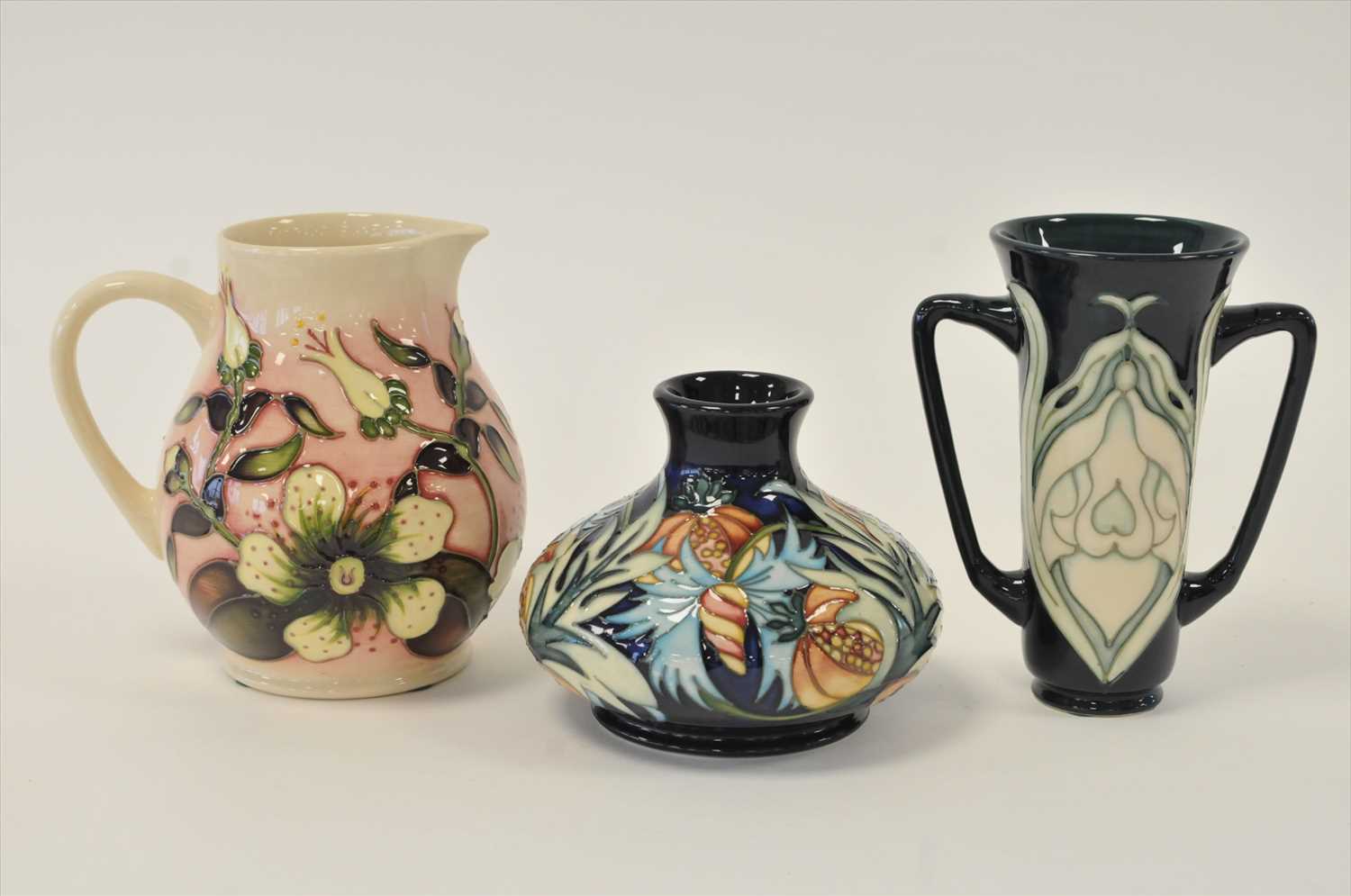 Lot 46 - Moorcroft vase, jug and loving cup