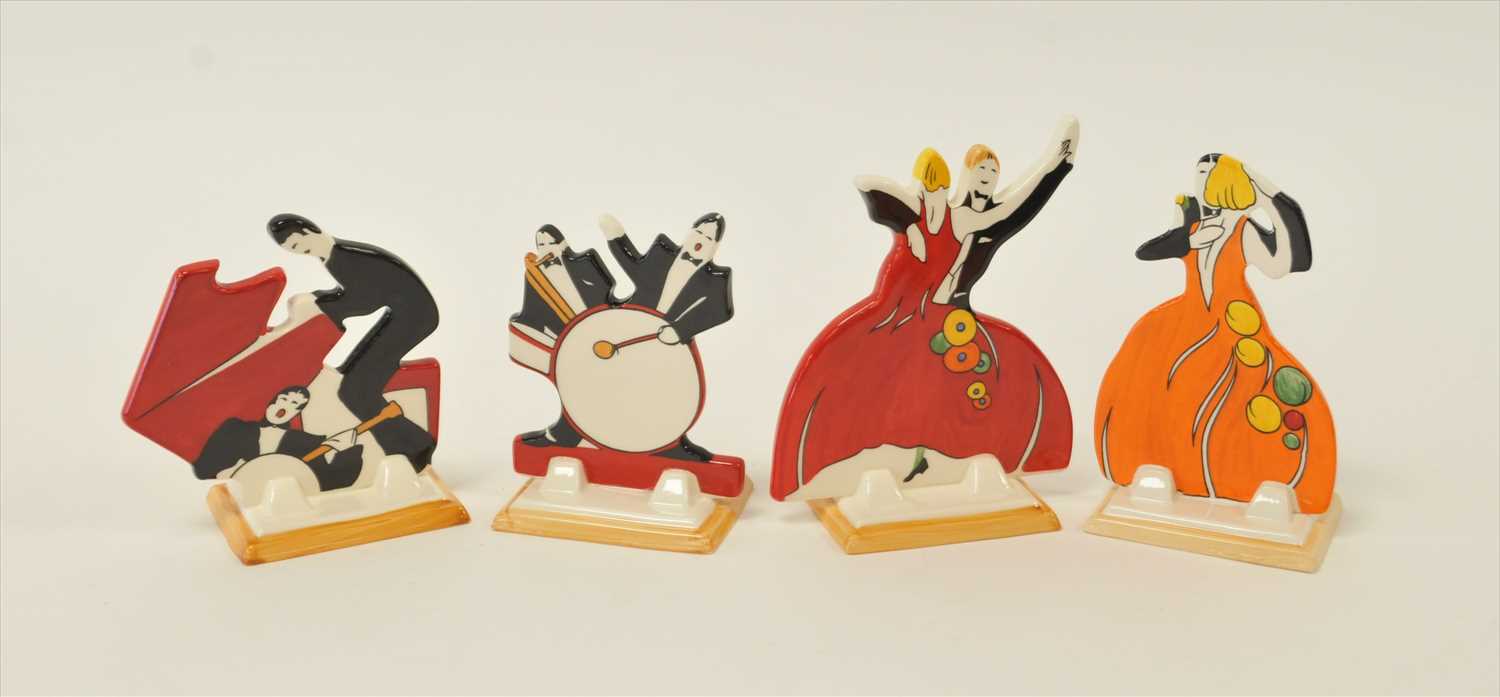 Lot 47 - Four Wedgwood 'Age of Jazz' Clarice Cliff figures