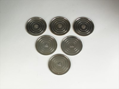Lot 32 - A set of four Georg Jensen small silver coasters