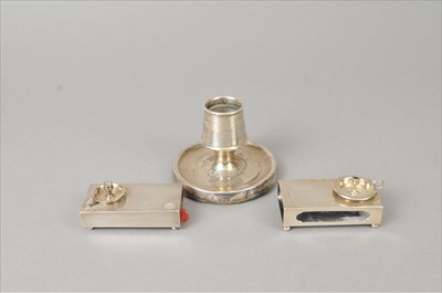 Lot 312 - Two silver match box holders and a silver mounted candlestick