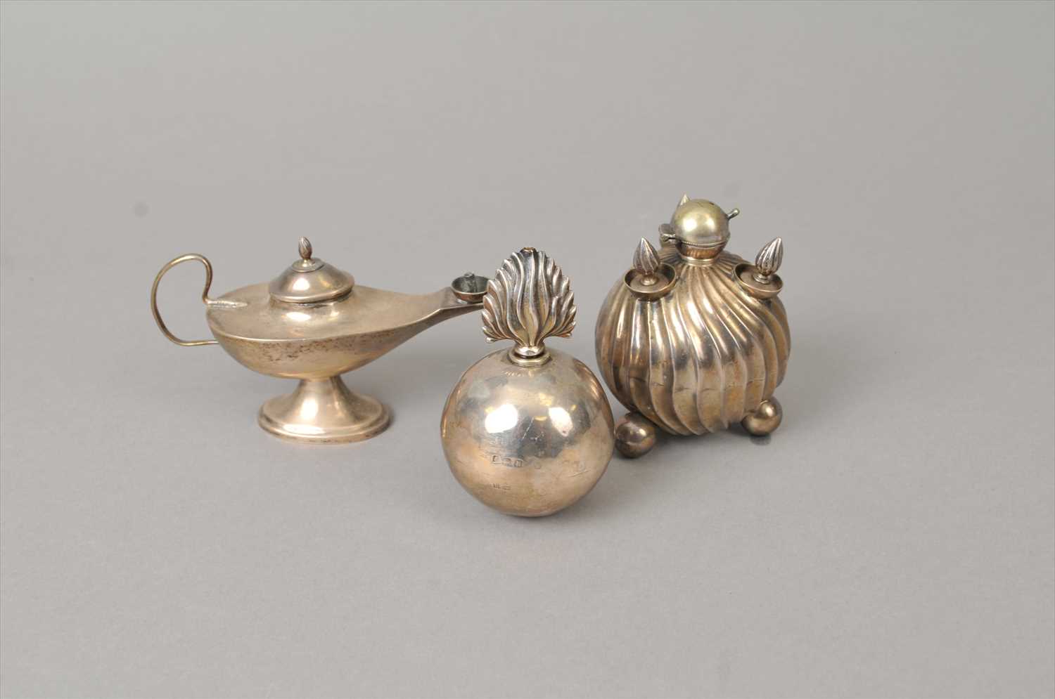 Lot 332 - Three silver table lighters