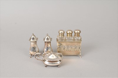 Lot 335 - A three piece silver cruet set