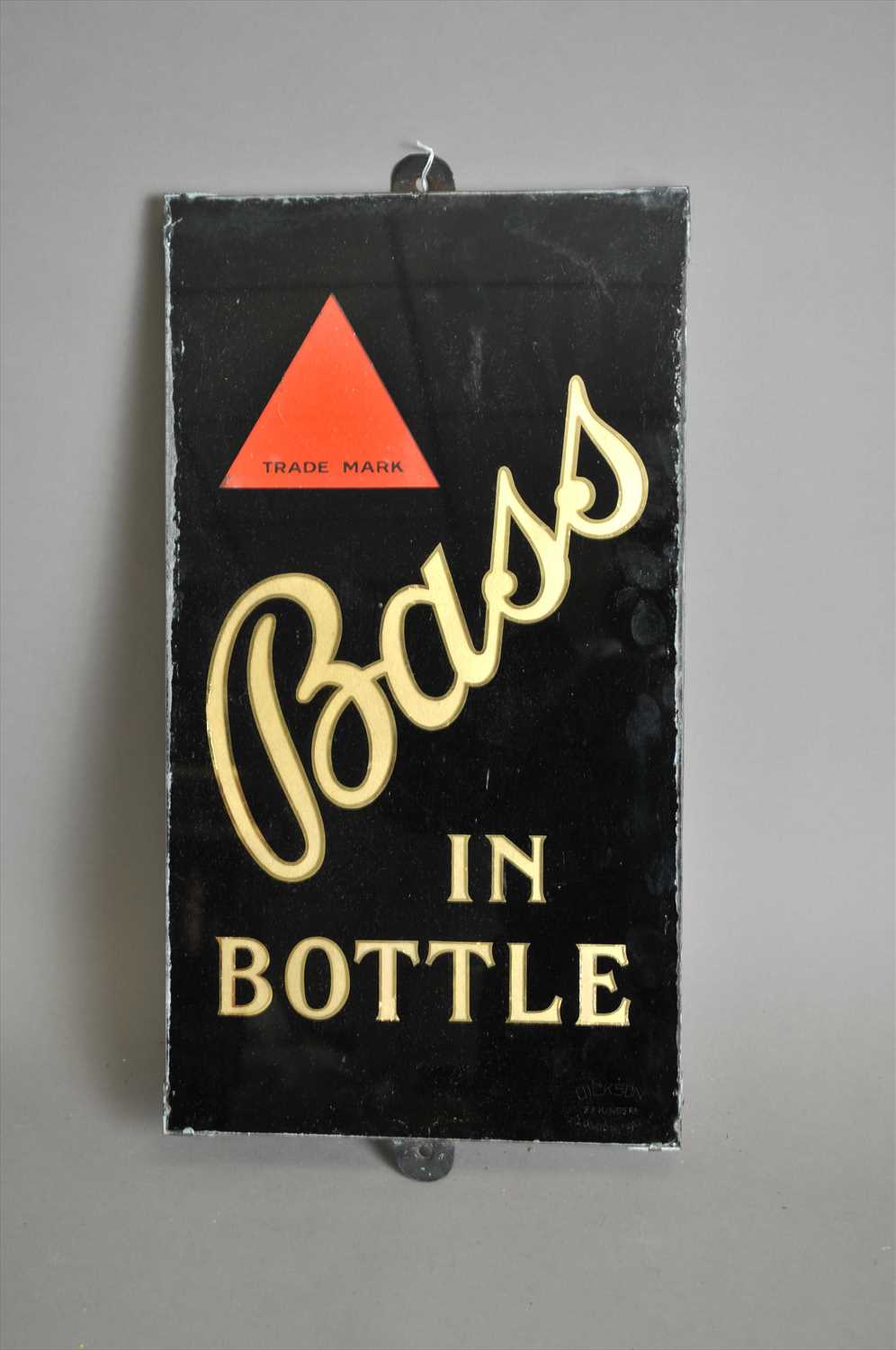 Lot 632 - An original slate-backed glass pub advertising sign for 'Bass In Bottle' by Dickson, London