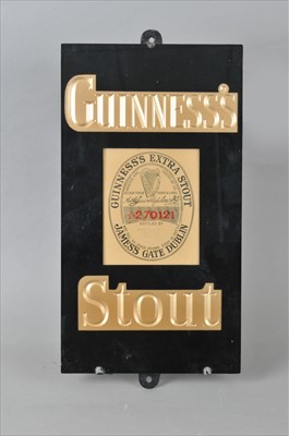 Lot 633 - An original 20th century slate backed pub sign advertising Guinness Stout