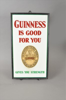 Lot 634 - An original 20th century glazed enamel pub sign advertising Guinness