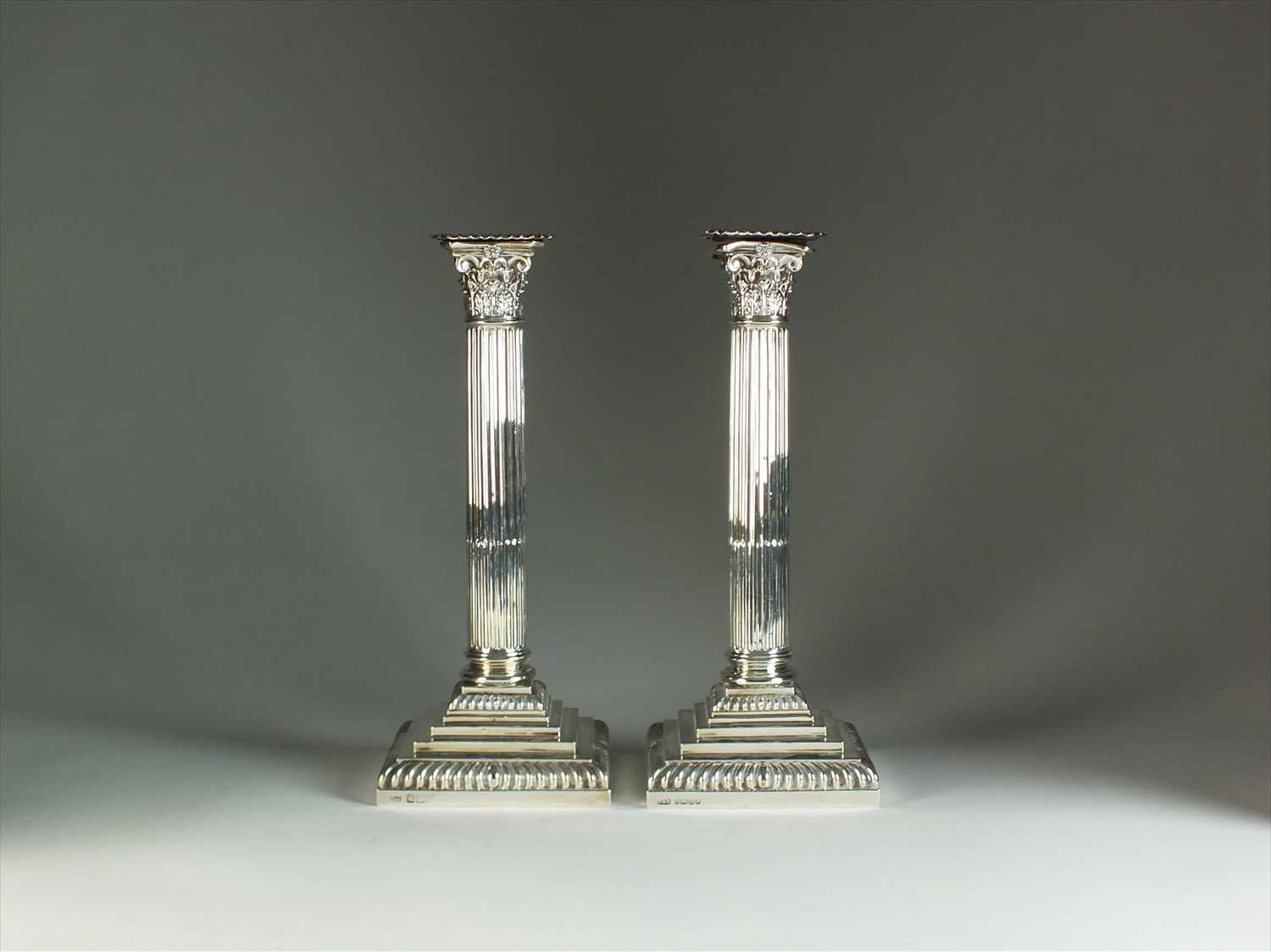 Lot 41 - A pair of Victorian silver candlesticks