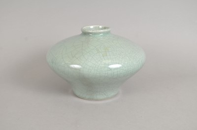 Lot 223 - A large crackle-glazed celadon coloured vase
