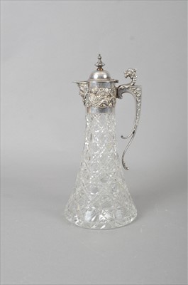 Lot 343 - A 19th century style silver mounted glass claret jug