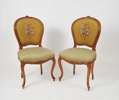 Lot 558 - A set of eight French upholstered walnut framed chairs