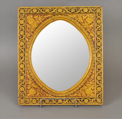 Lot 454 - A Qajar lacquered and gilded papier mache framed wall mirror