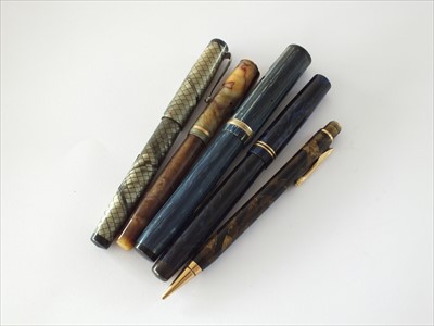 Lot 49 - A collection of four fountain pens and a Conklin propelling pencil