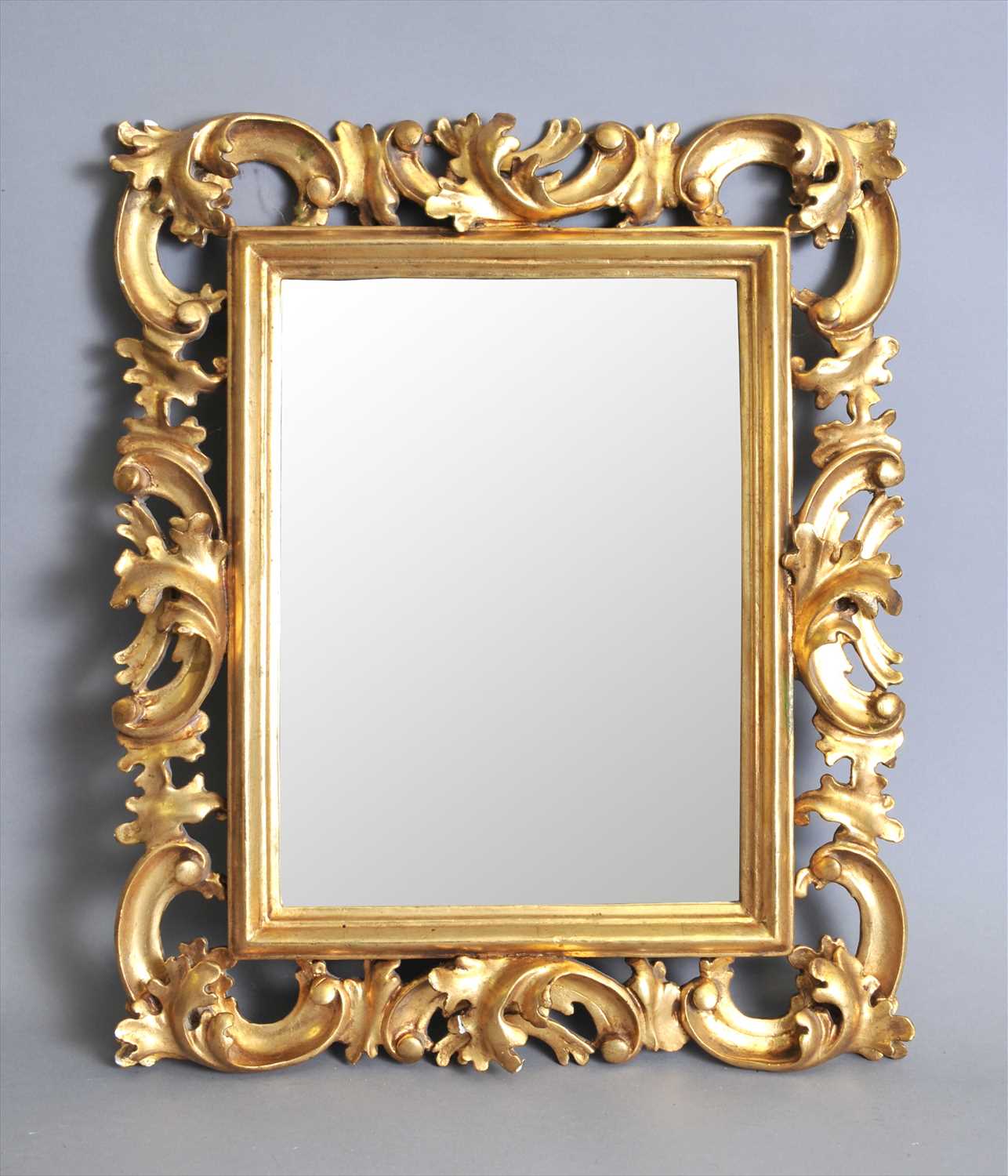 Lot 617 - A decorative 19th century gilt wood and plaster Florentine type frame (mirror)