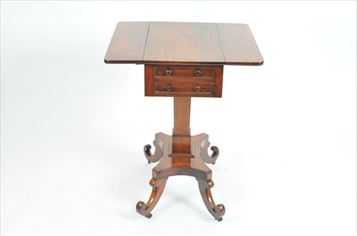 Lot 513 - A small Victorian rosewood writing table