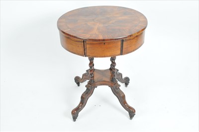 Lot 542 - A Victorian revolving drum topped occasional table