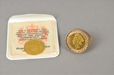 Lot 410 - A 9ct gold coin set ring