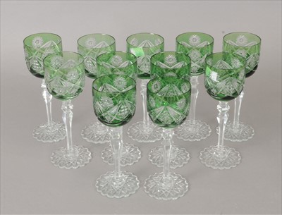 Lot 88 - A set of eleven Bohemian green-tinted hock glasses