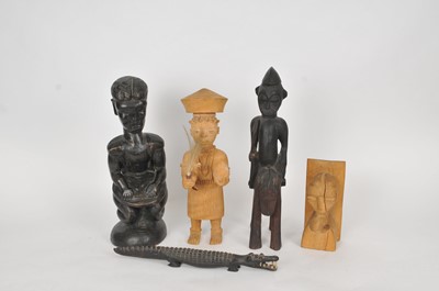 Lot 425 - A mixed collectiion of African tribal carved hardwood figures (9)