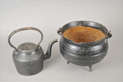 Lot 500 - A cast iron cauldron, a kettle and hat box