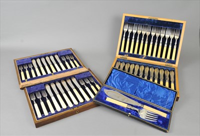 Lot 317 - A cased set of silver fish knives and forks