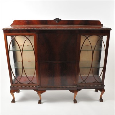Lot 595 - A 1920's mahogany George II style breakfront display cabinet