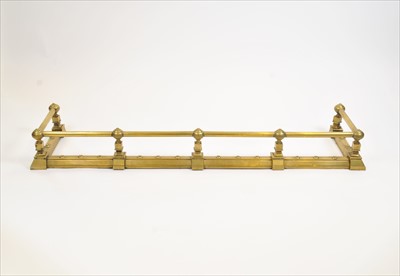 Lot 417 - A Large 19th century polished brass country house fire place curb fender