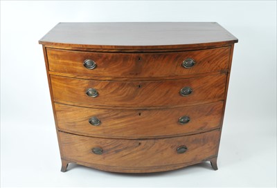 Lot 609 - A large 19th century mahogany veneered bow-fronted chest of four graduating long drawers