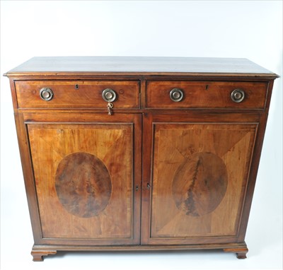 Lot 585 - A large George III mahogany hall cupboard