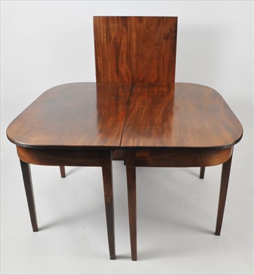 Lot 598 - A 19th century mahogany demi-lune dining table
